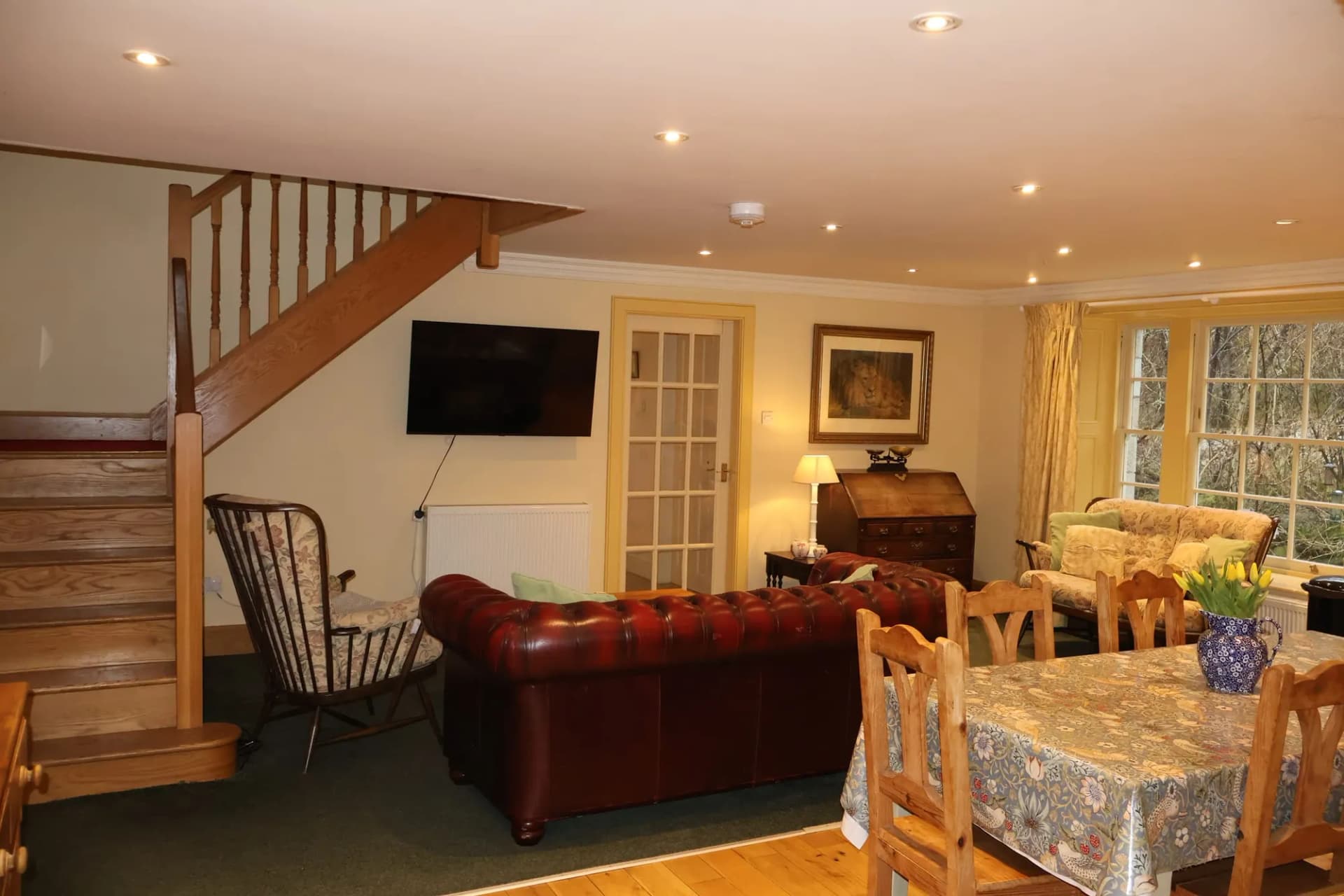 The sitting room, with the stair behind